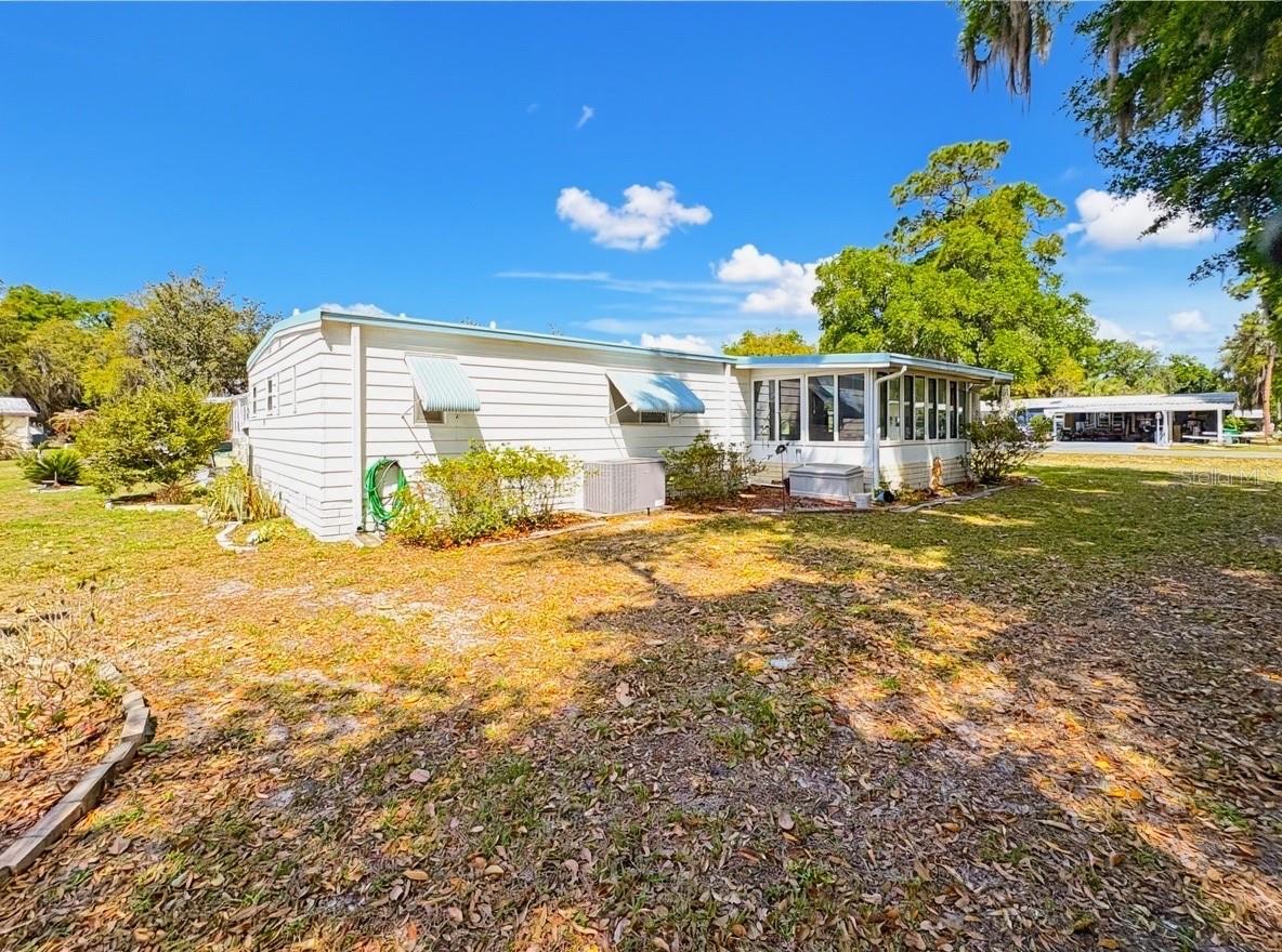 22 S BOBWHITE RD, WILDWOOD, FL — photo 5