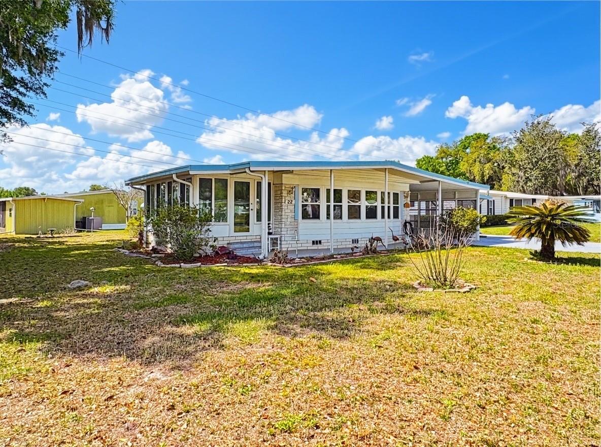 22 S BOBWHITE RD, WILDWOOD, FL — photo 7