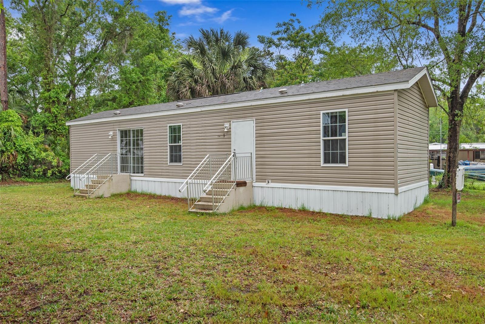 55917 CABBAGE RD, ASTOR, FL