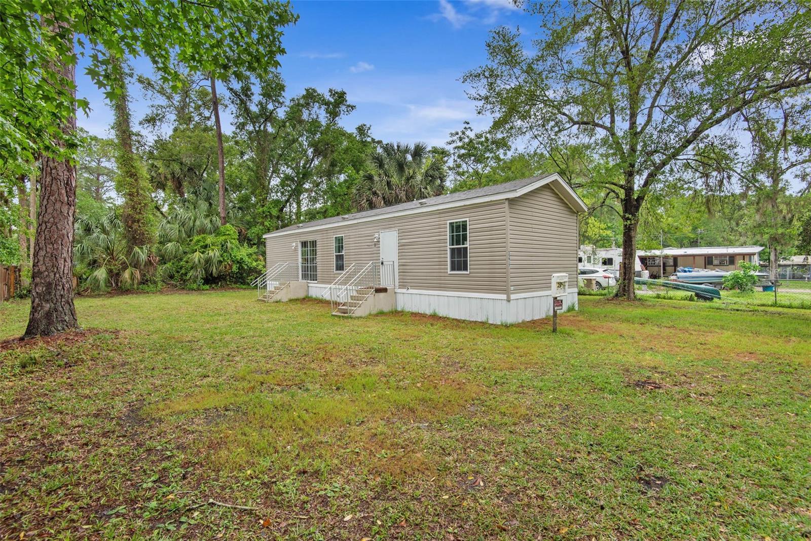 55917 CABBAGE RD, ASTOR, FL — photo 4