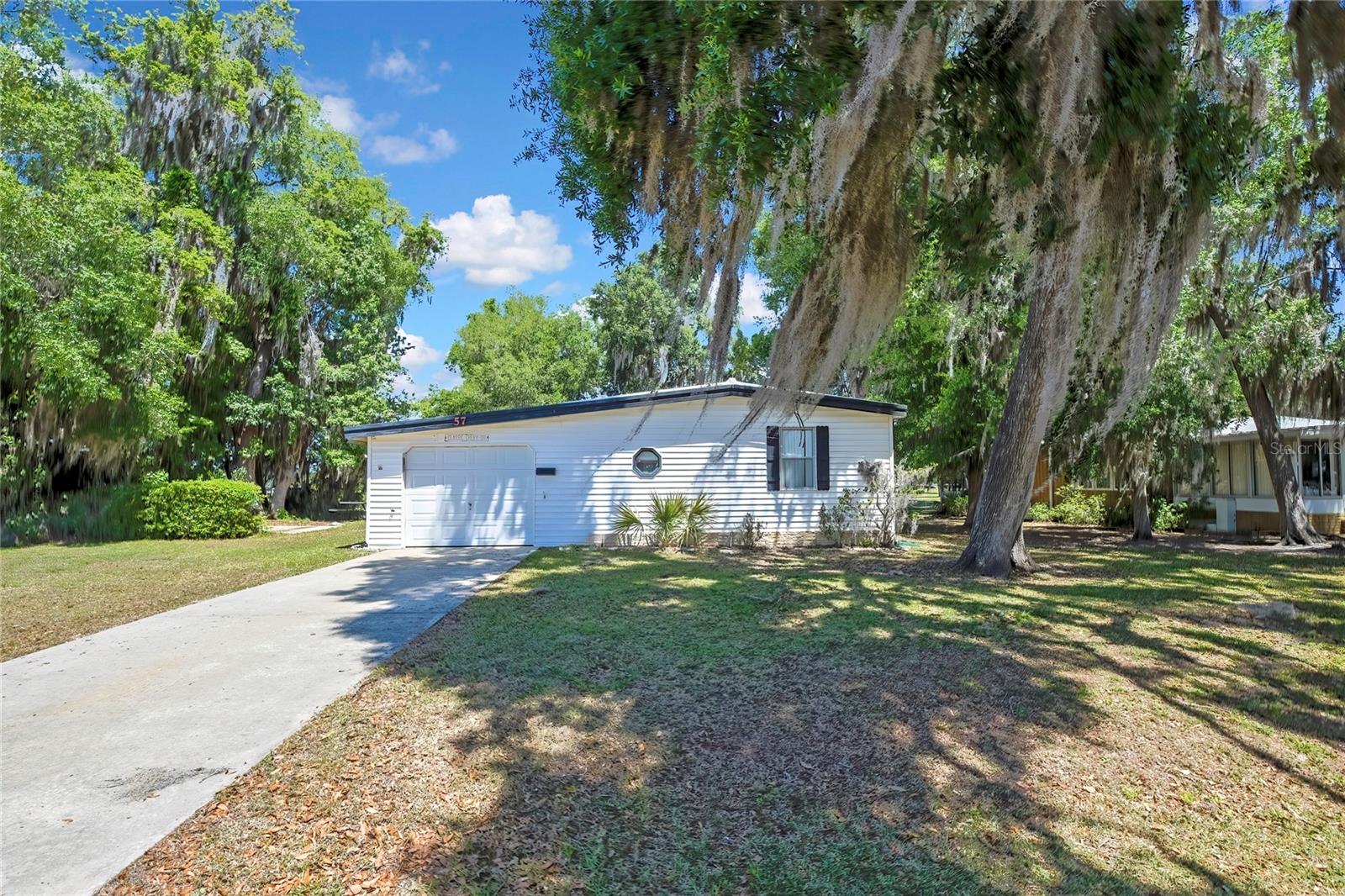 57 N BOBWHITE RD, WILDWOOD, FL