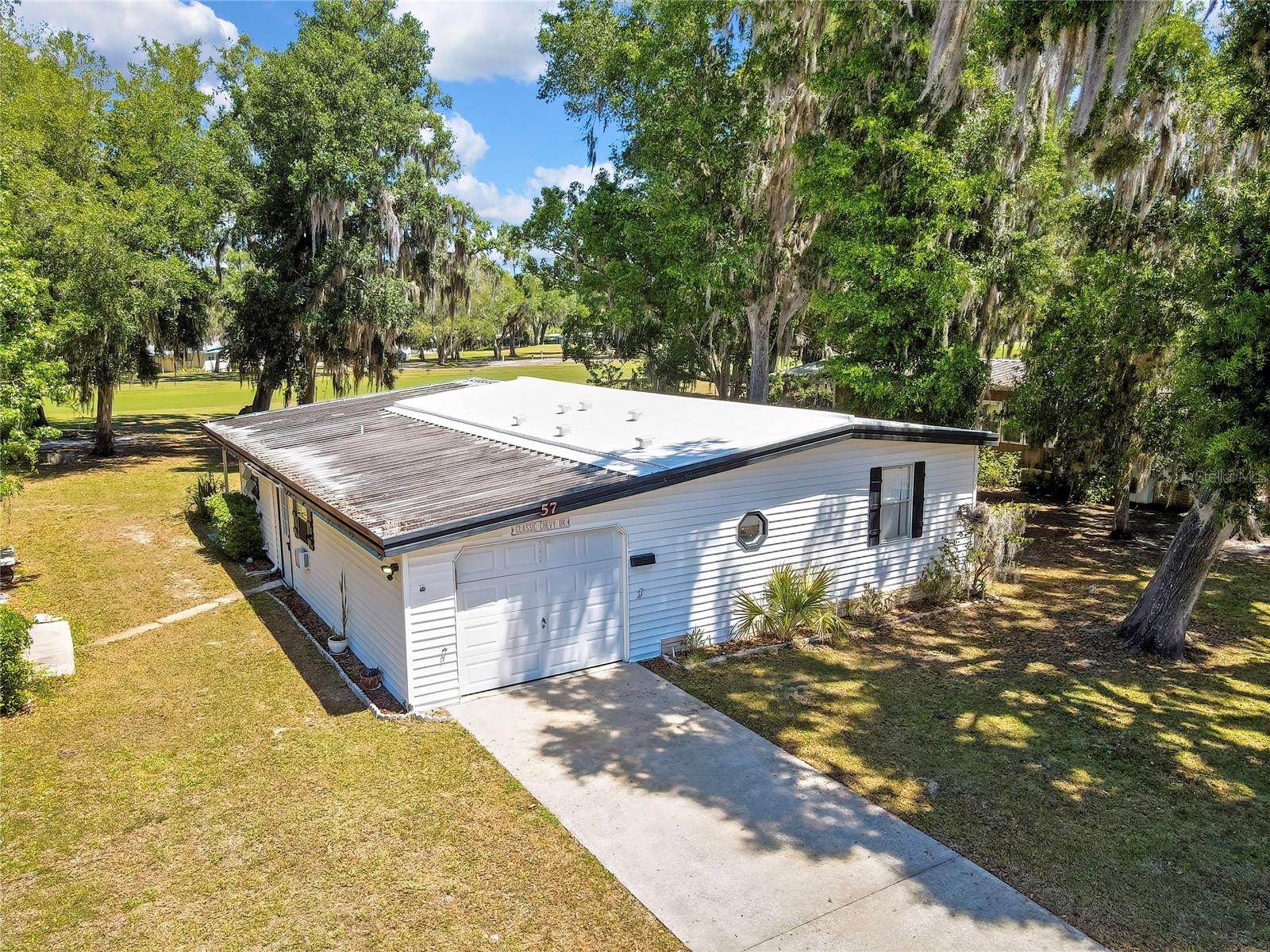57 N BOBWHITE RD, WILDWOOD, FL — photo 25