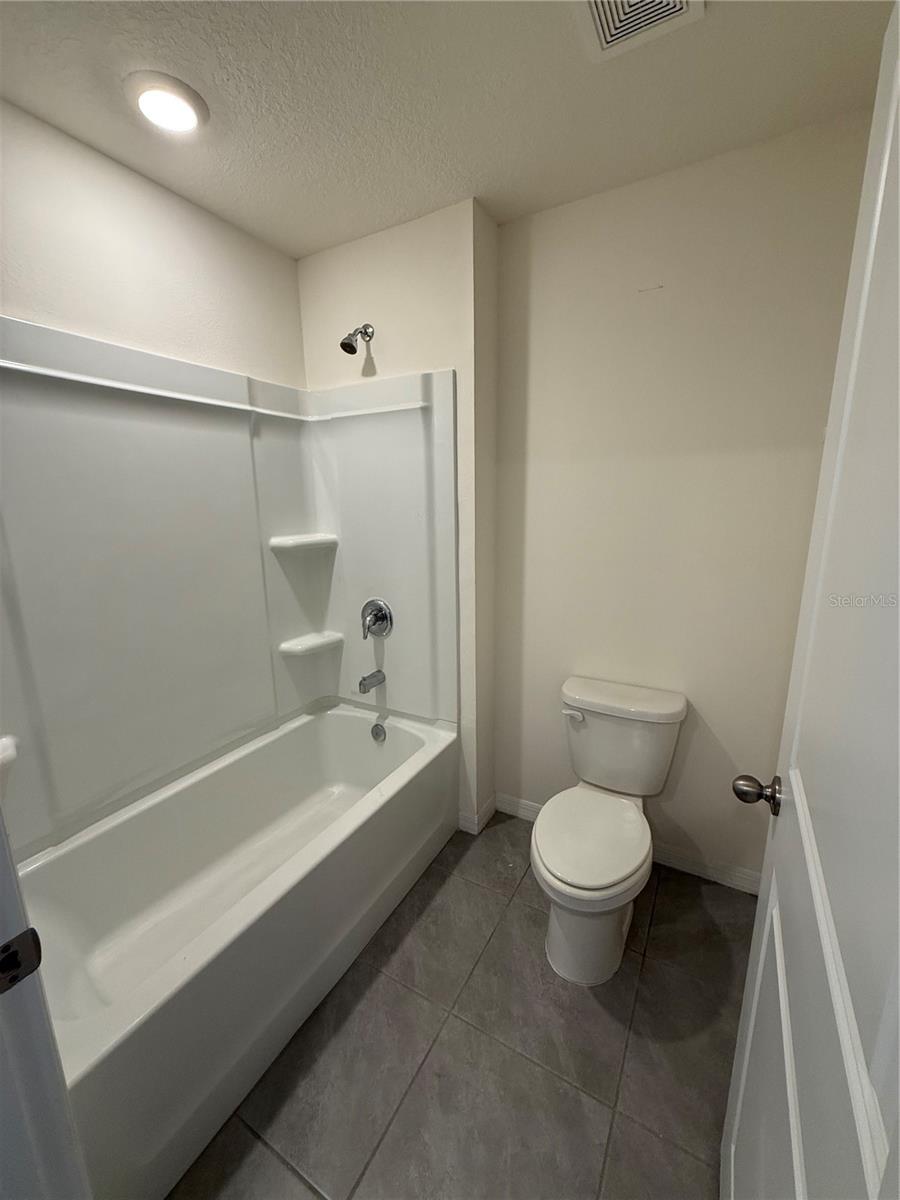 7499 SAIL CLOVER LN, ZEPHYRHILLS, FL — photo 5
