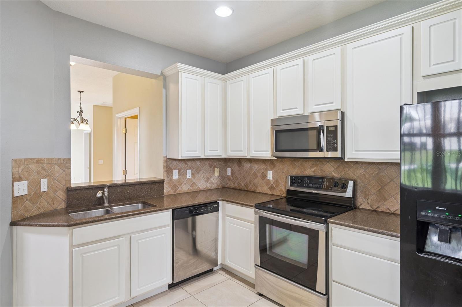 722 CHACALL LOOP, MOUNT DORA, FL — photo 4