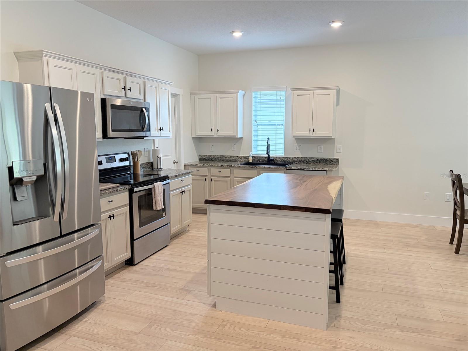 15631 MERLIN AVE, MASCOTTE, FL — photo 7