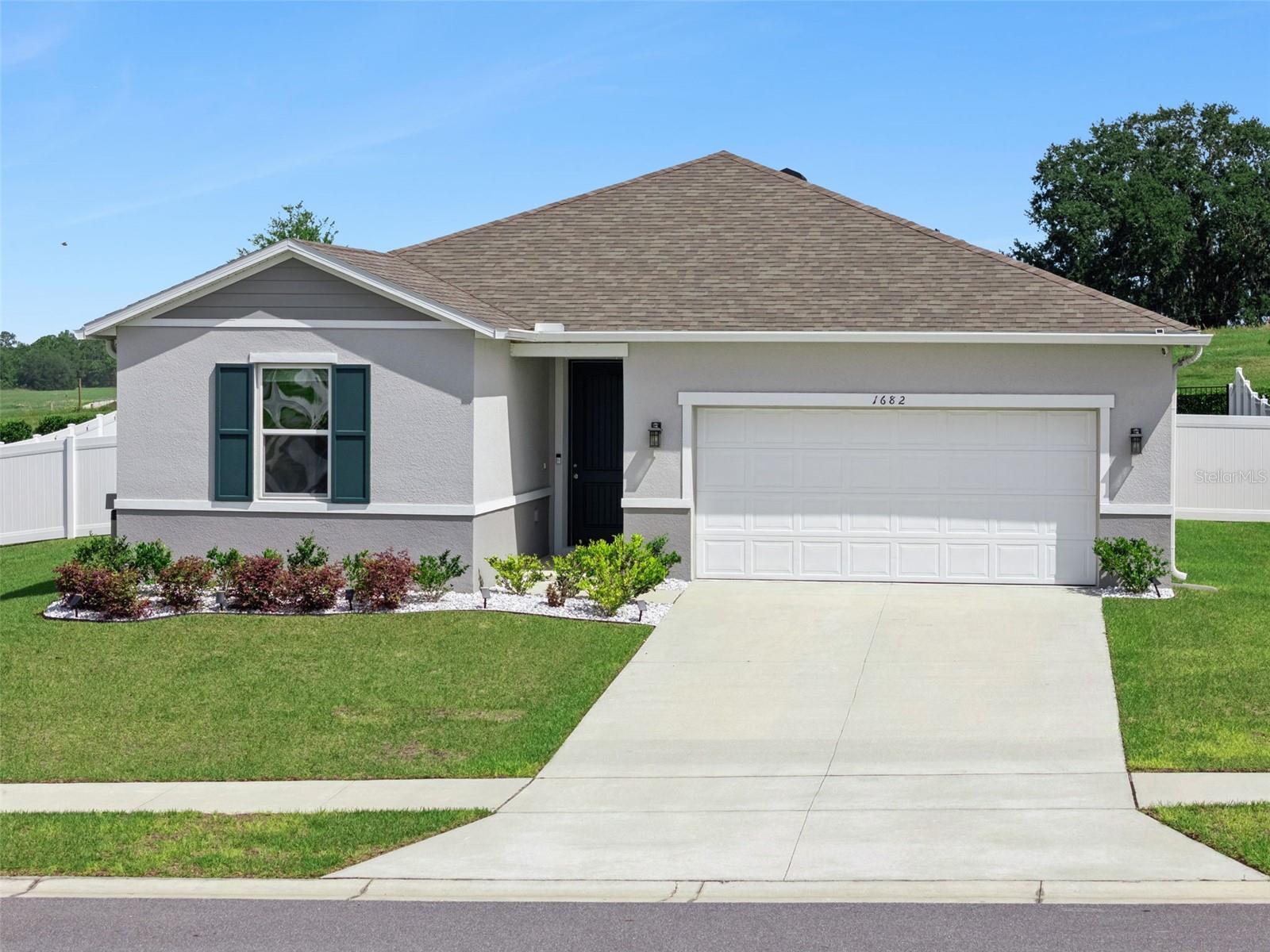 1682 LITTLELEAF BOXWOOD LOOP, MASCOTTE, FL — photo 4