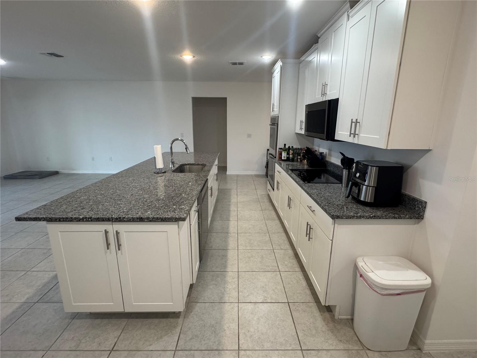 6615 RHYTHM DR, MASCOTTE, FL — photo 12