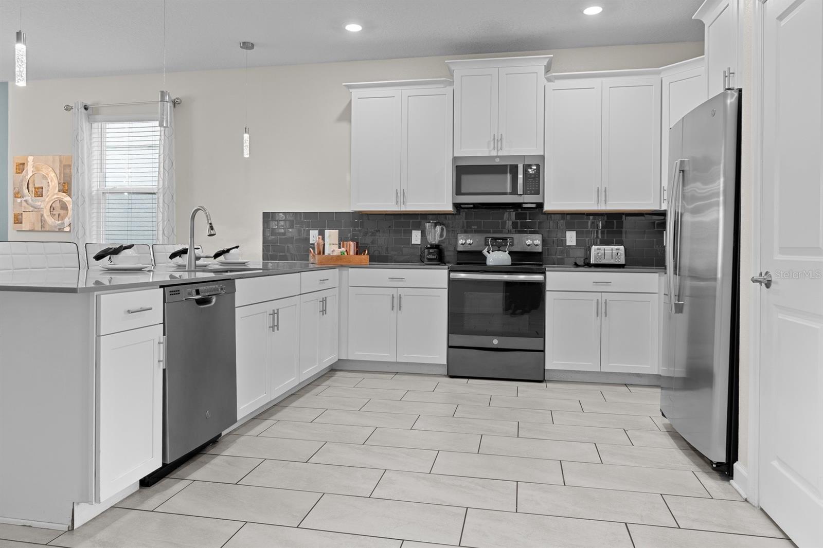 8876 CABOT CLIFFS DR, DAVENPORT, FL — photo 10