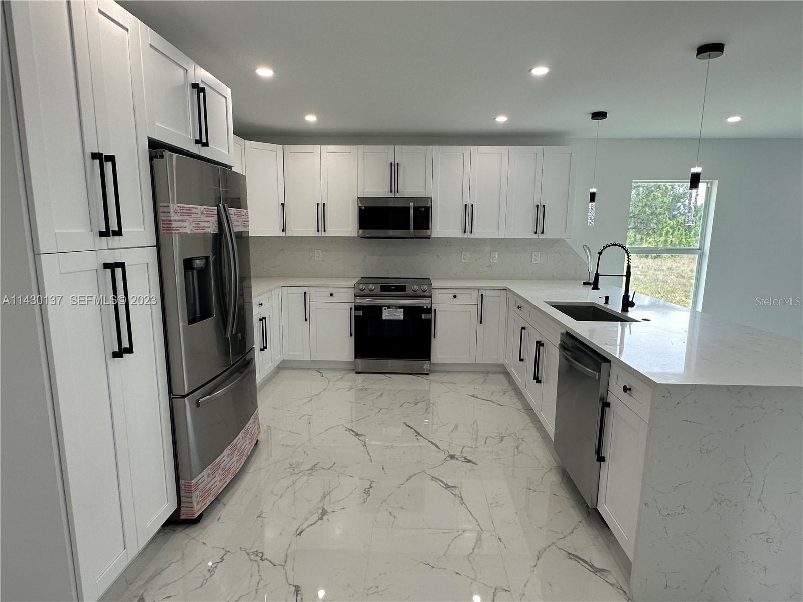 1125 MILWAUKEE BLVD, LEHIGH ACRES, FL — photo 3