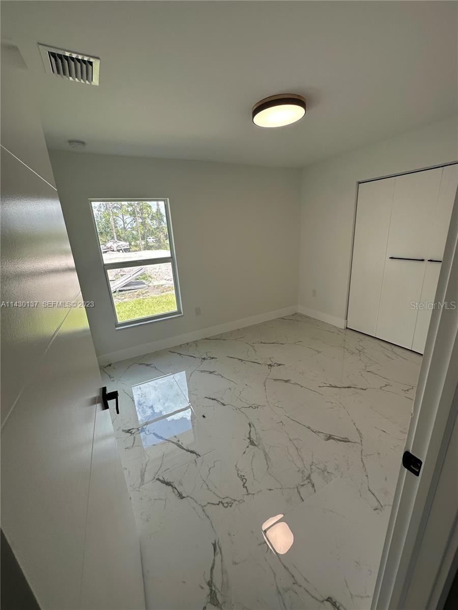 1125 MILWAUKEE BLVD, LEHIGH ACRES, FL — photo 10