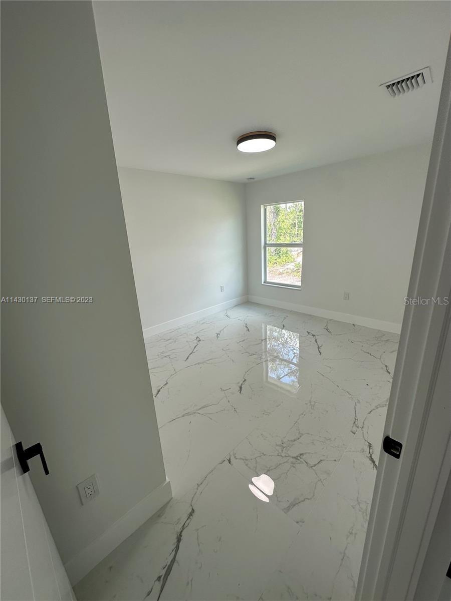 1125 MILWAUKEE BLVD, LEHIGH ACRES, FL — photo 12
