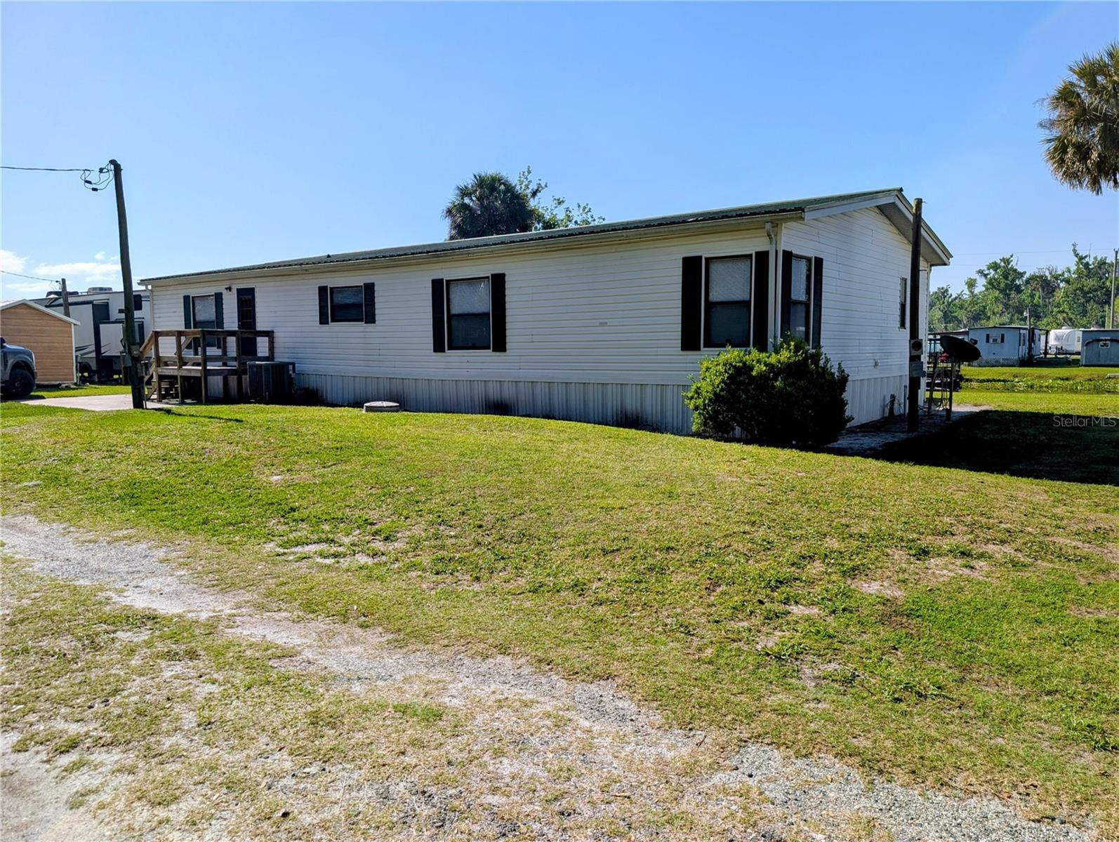 25836 MANHATTAN LN, ASTOR, FL — photo 19