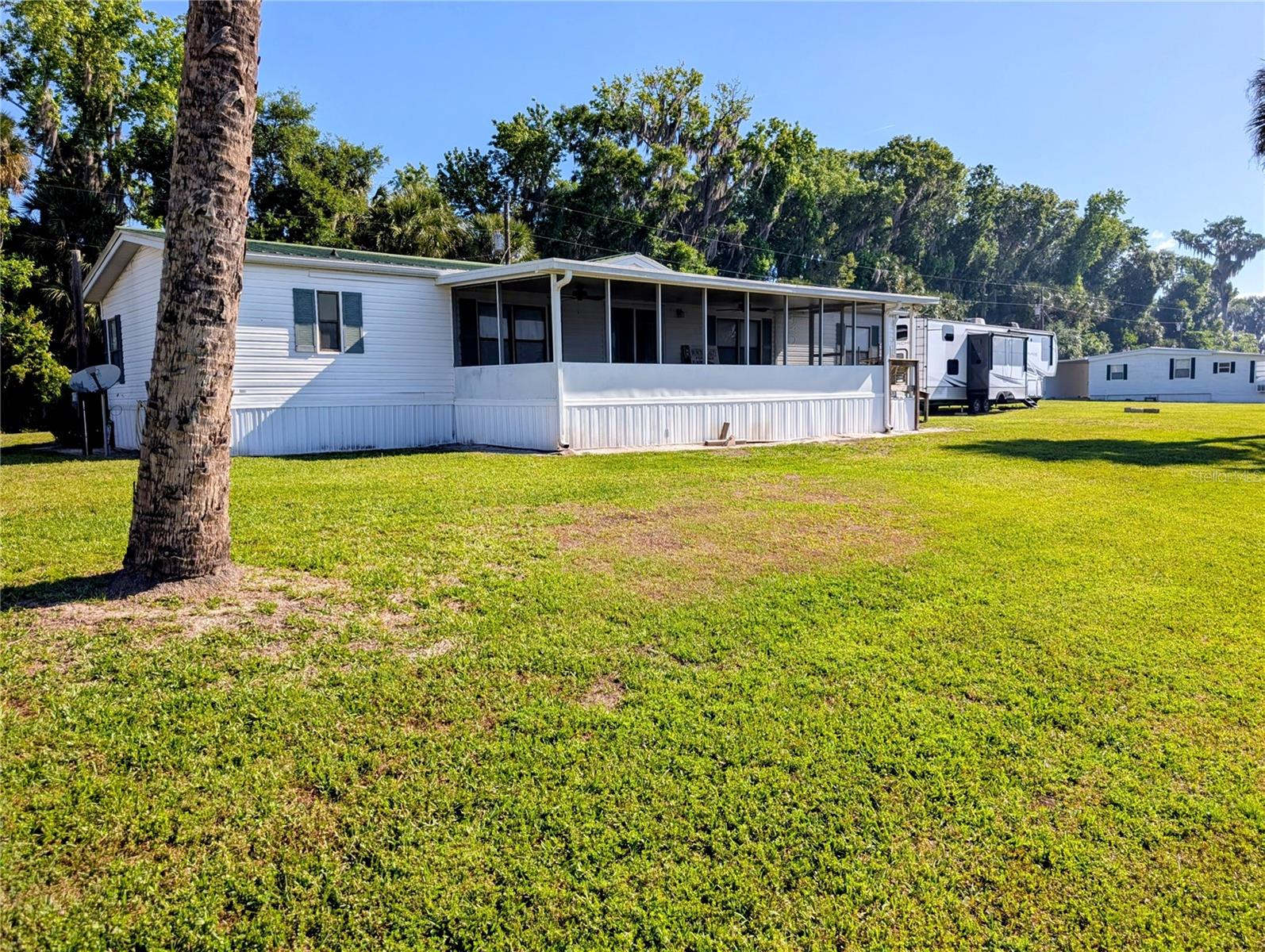 25836 MANHATTAN LN, ASTOR, FL — photo 29