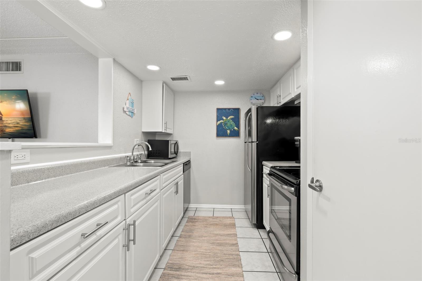 8911 BLIND PASS RD #214, ST PETE BEACH, FL — photo 9