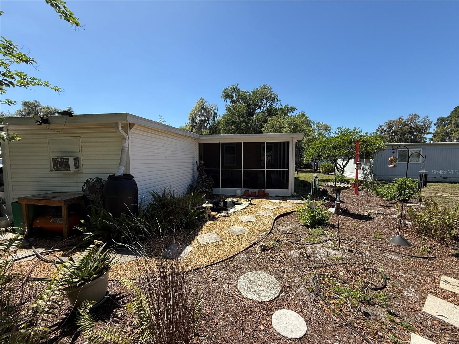 9 S BOBWHITE RD, WILDWOOD, FL — photo 26