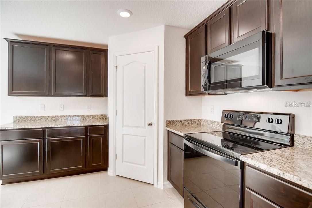 1597 ORNE ST, MASCOTTE, FL — photo 5