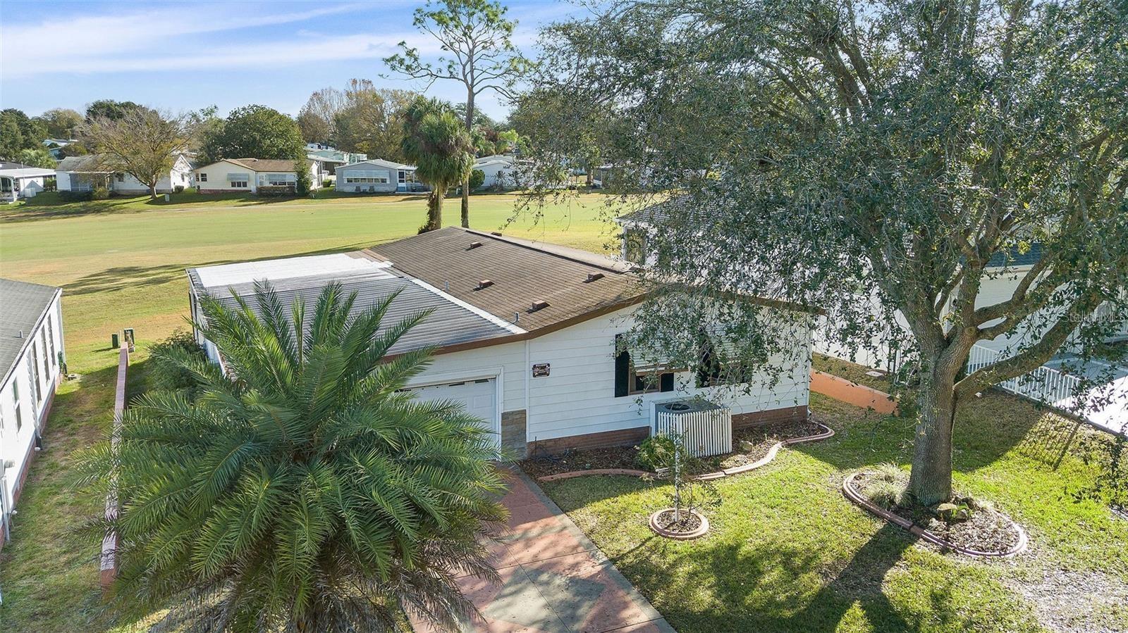 1609 MAGNOLIA AVE, THE VILLAGES, FL — photo 4