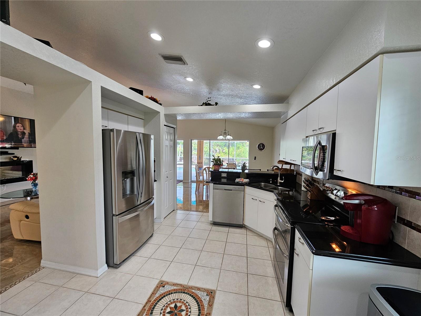114 ALBATROSS RD, ROTONDA WEST, FL — photo 9
