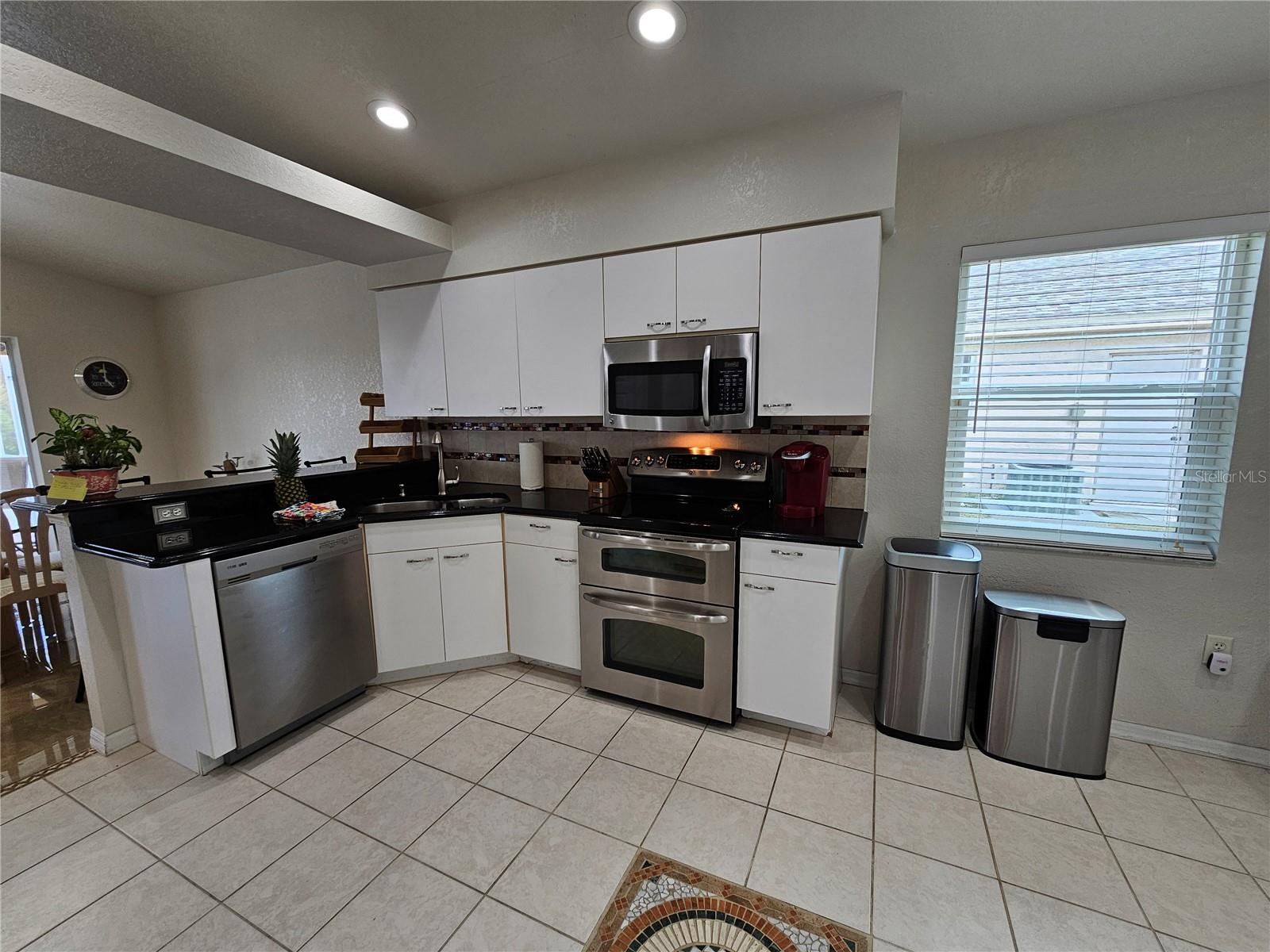 114 ALBATROSS RD, ROTONDA WEST, FL — photo 11
