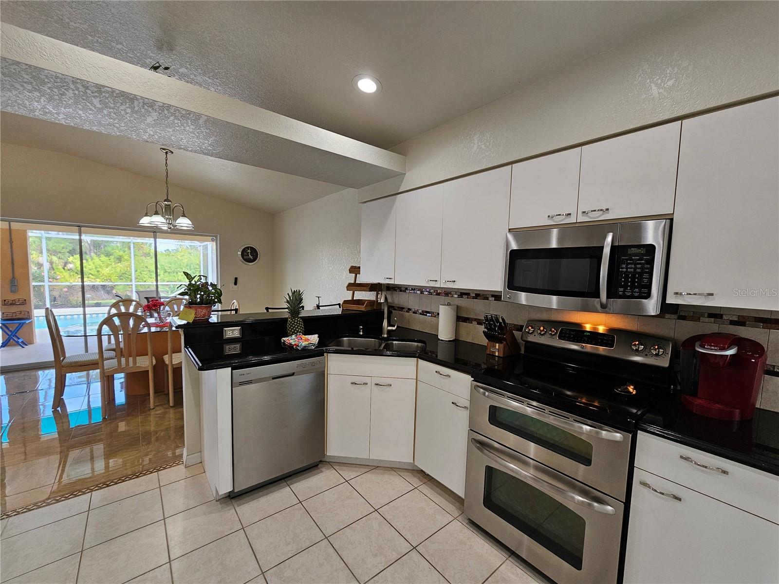 114 ALBATROSS RD, ROTONDA WEST, FL — photo 13