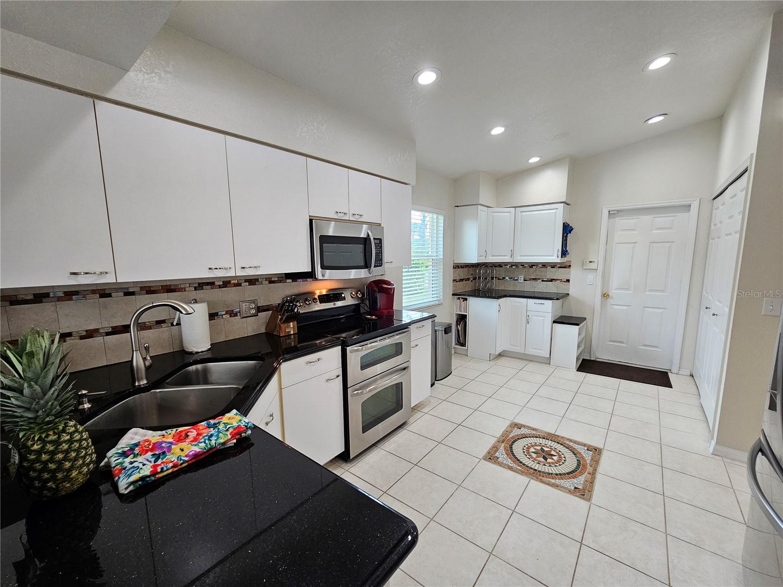 114 ALBATROSS RD, ROTONDA WEST, FL — photo 14