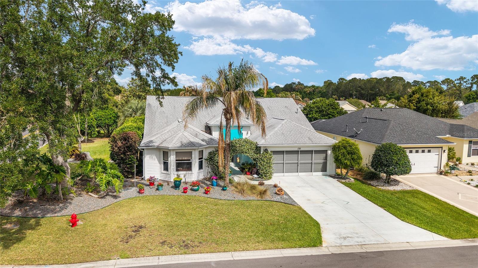 1311 OPORTO DR, THE VILLAGES, FL — photo 40