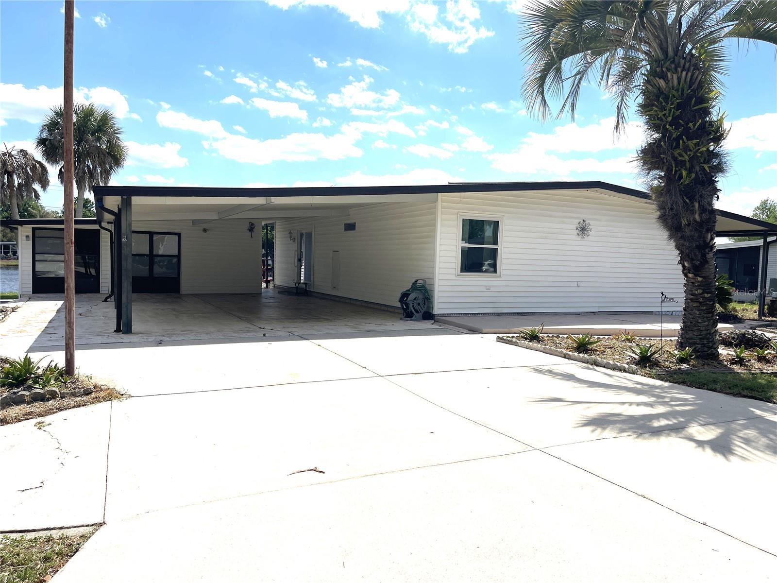 2 GROVE TRAIL, WILDWOOD, FL — photo 2