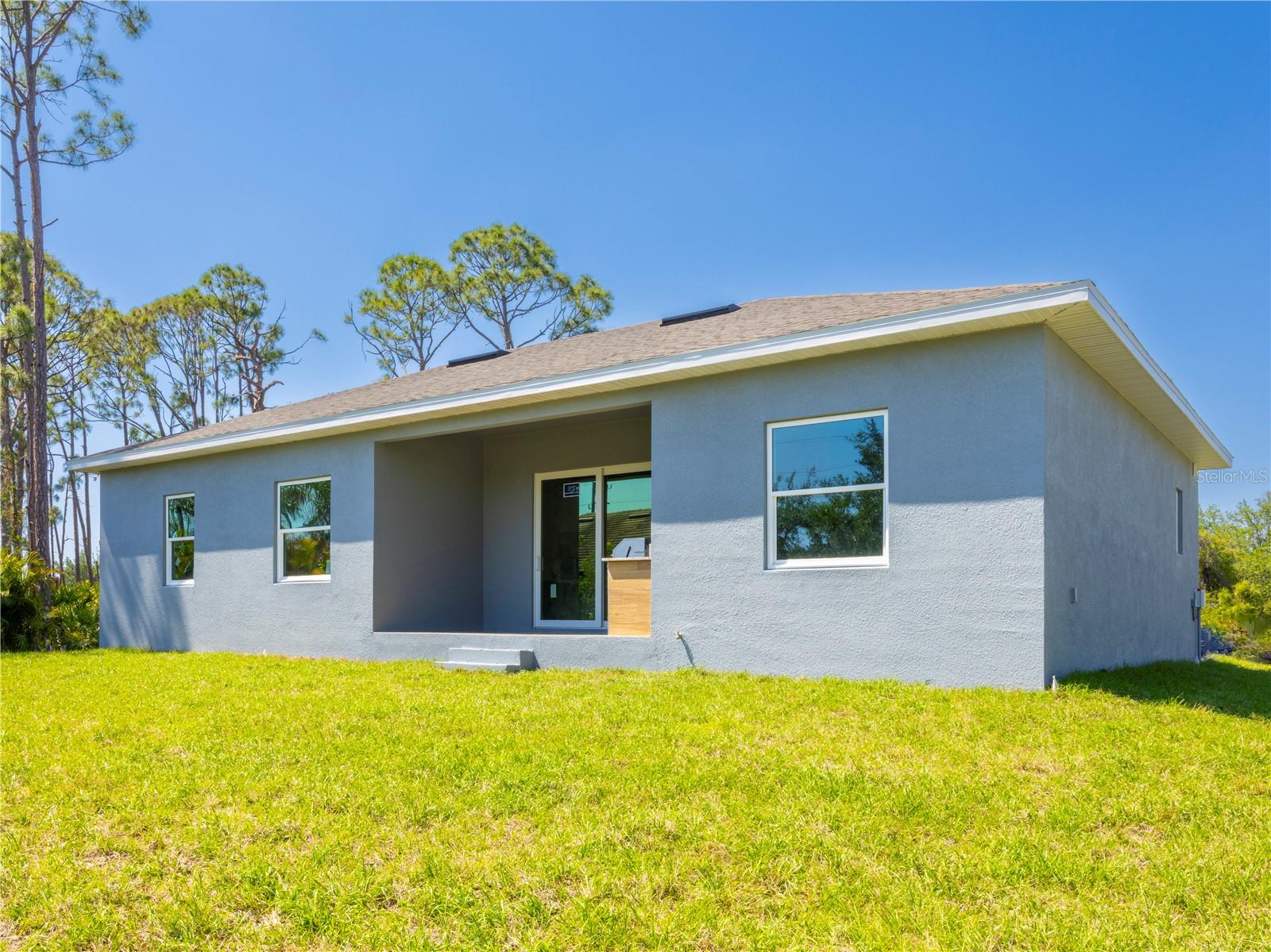 9443 HALLENDALE DR, PORT CHARLOTTE, FL — photo 4