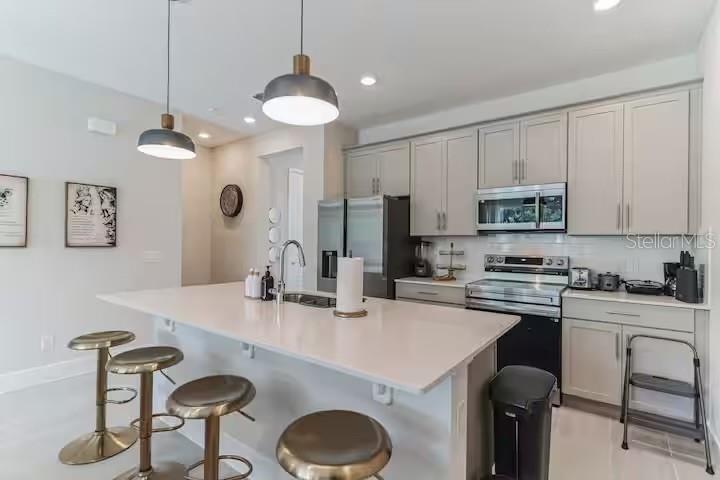 7842 SPECTRUM DR, REUNION, FL — photo 9