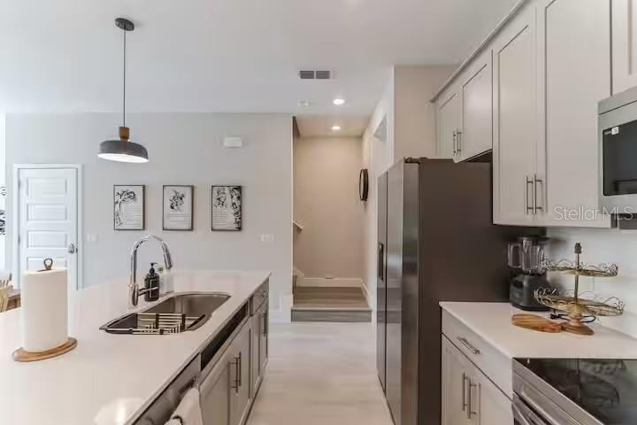 7842 SPECTRUM DR, REUNION, FL — photo 10