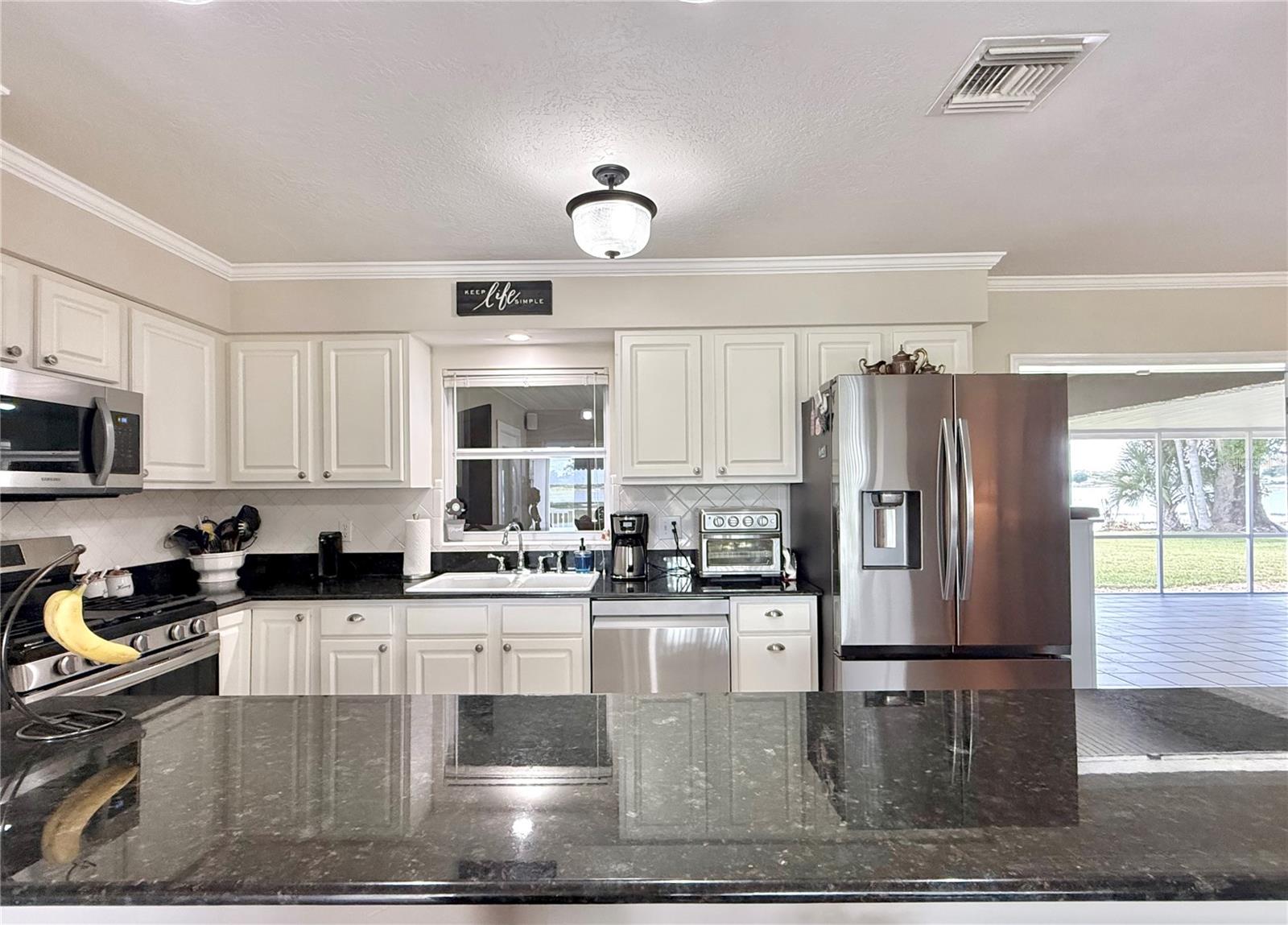 77 W LAKE DAMON DR, AVON PARK, FL — photo 12
