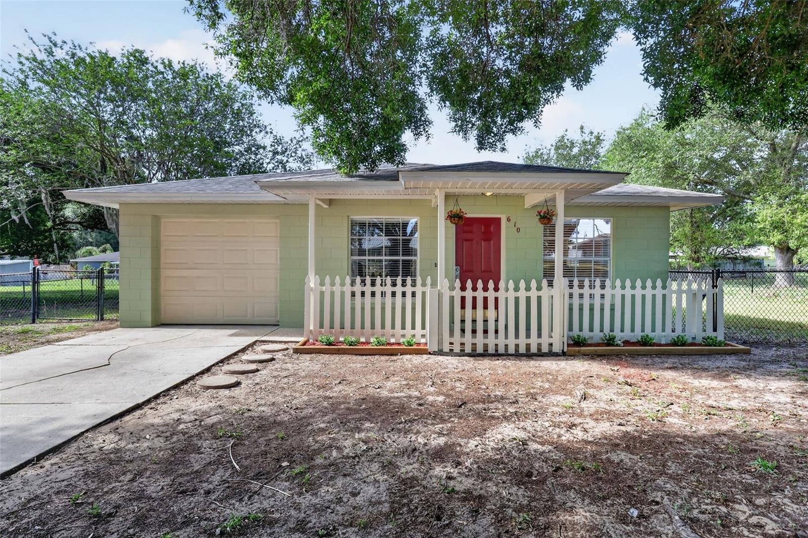 610 PALMETTO DR, MASCOTTE, FL — photo 7
