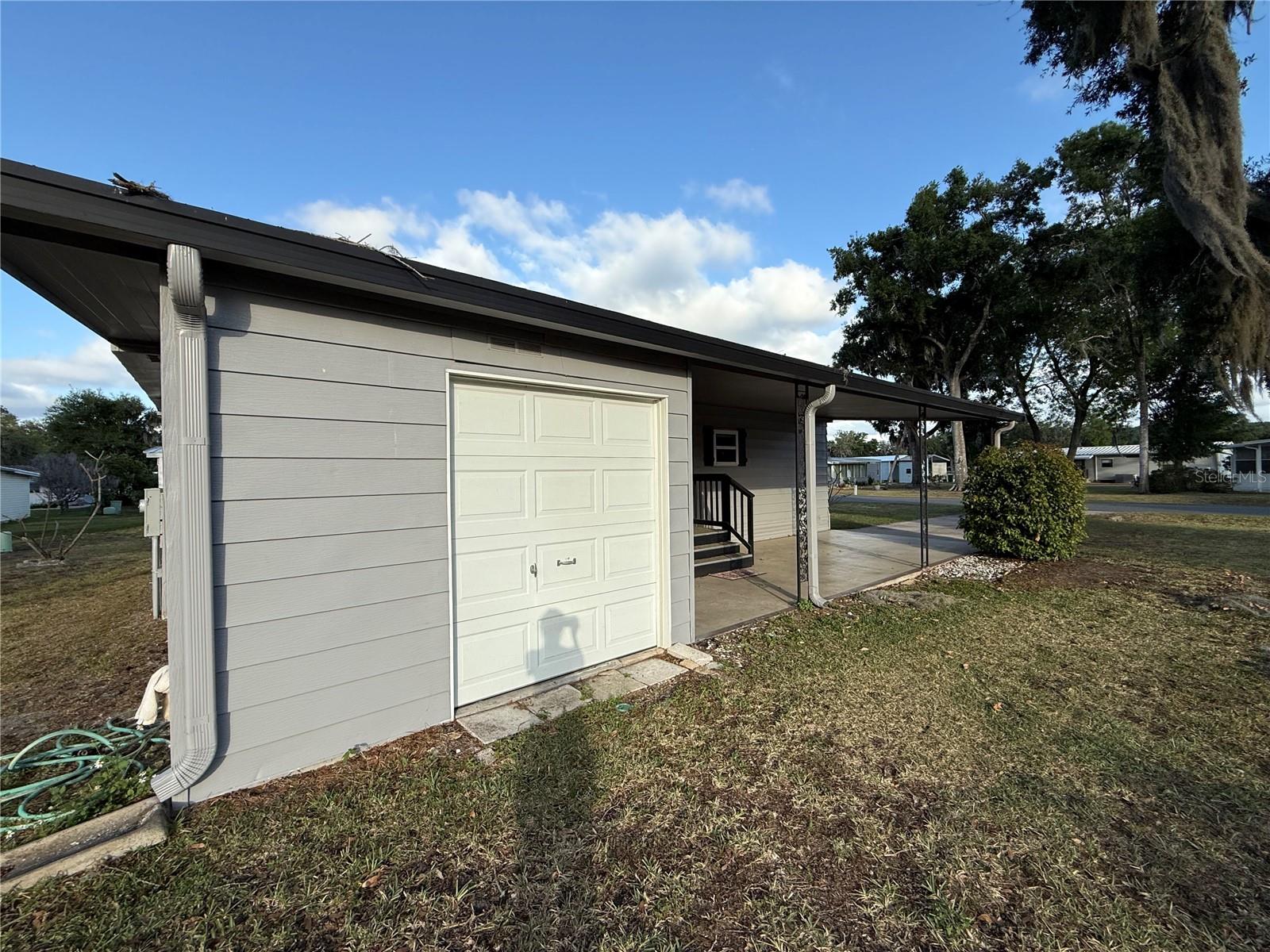 27 S BOBWHITE RD, WILDWOOD, FL — photo 29