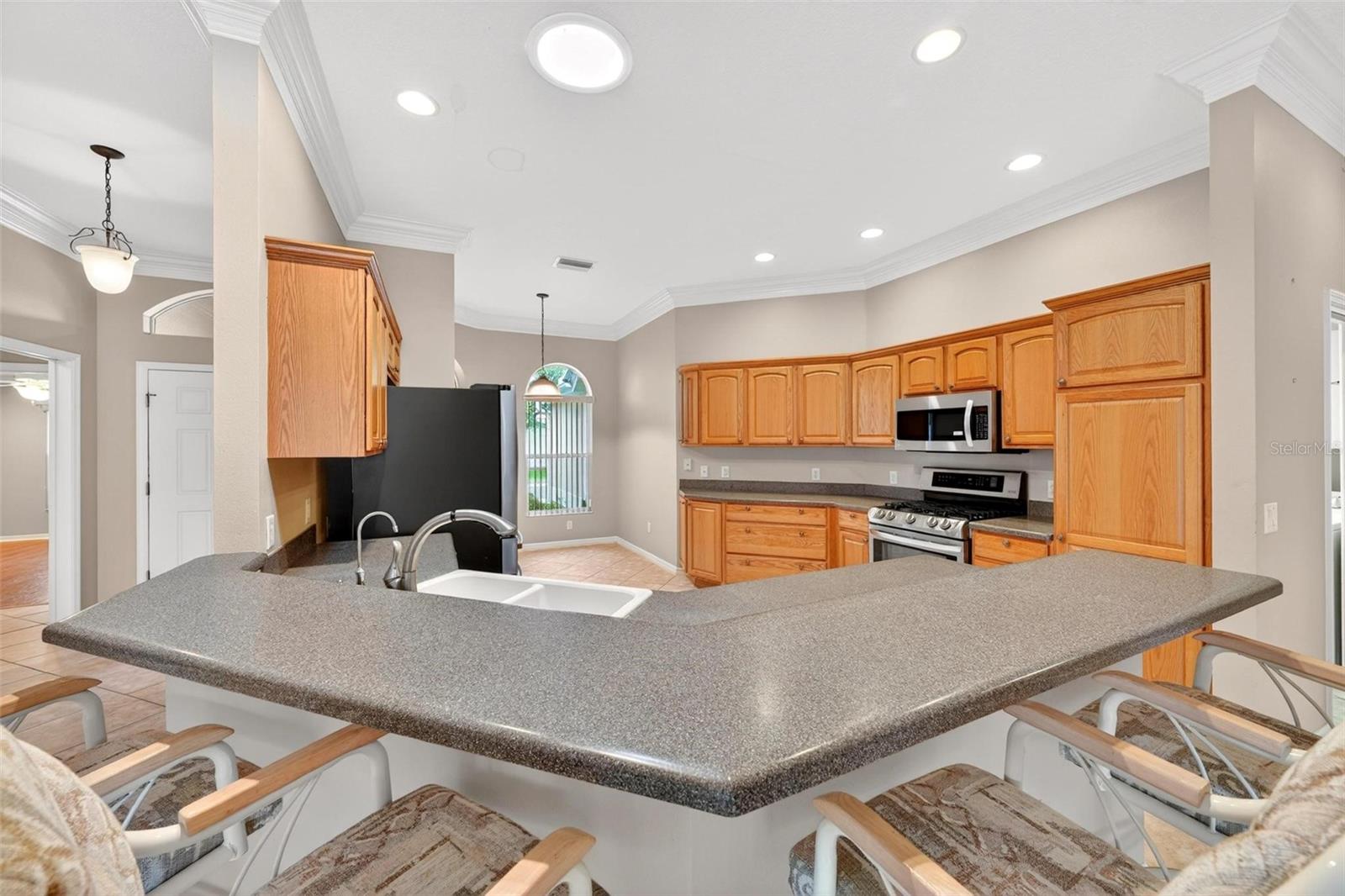 2612 MORVEN PARK WAY, THE VILLAGES, FL — photo 18