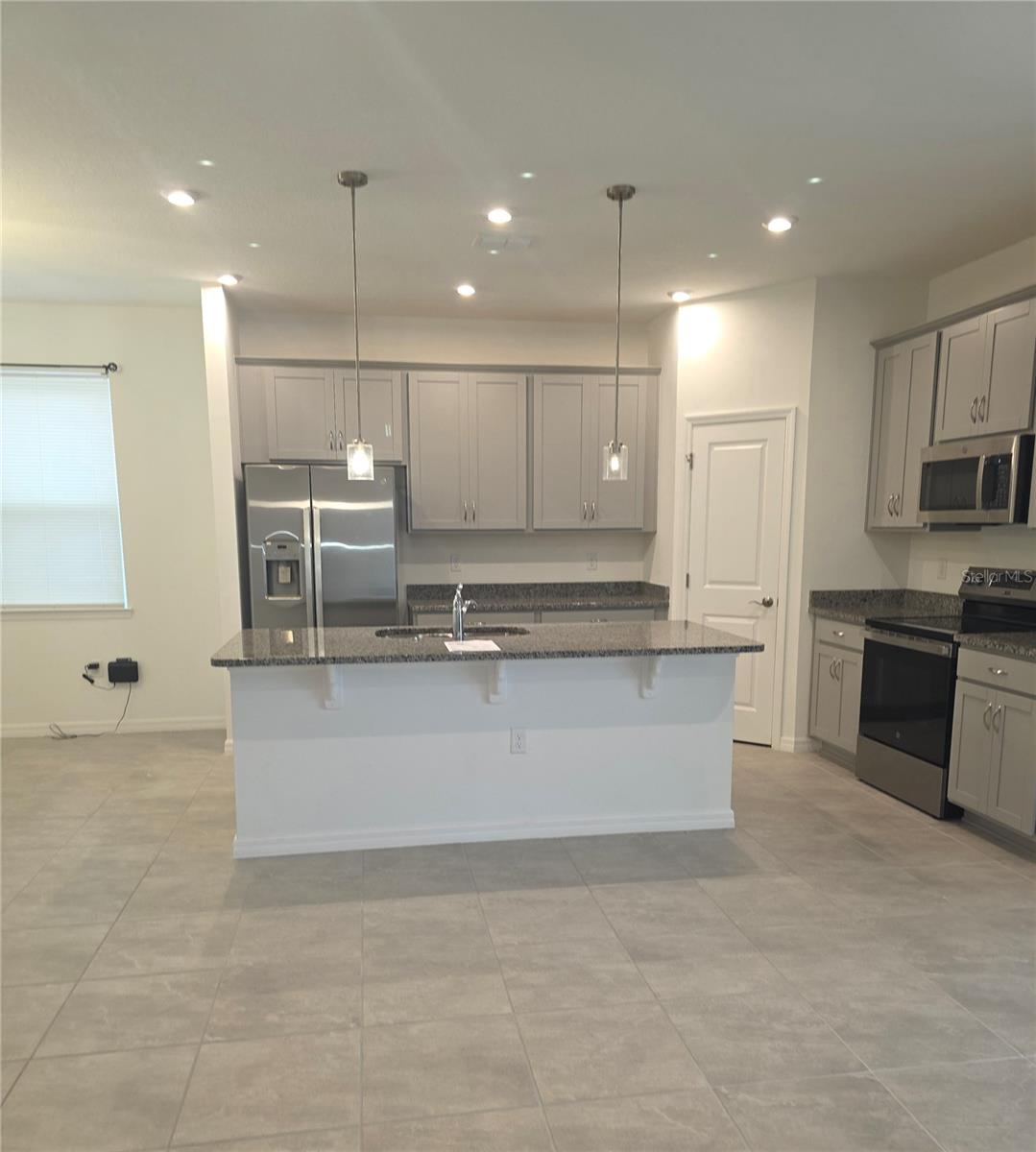 1838 BLUE LAGOON CIR, MASCOTTE, FL — photo 13