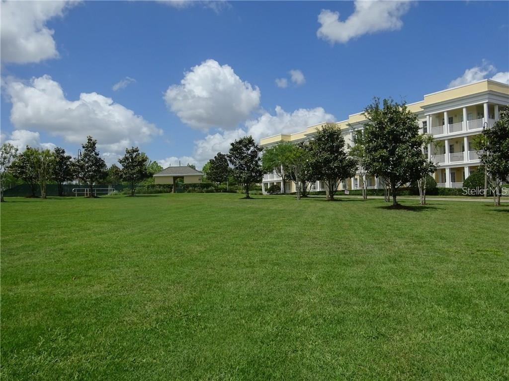 7509 MOURNING DOVE CIR #304, REUNION, FL — photo 28