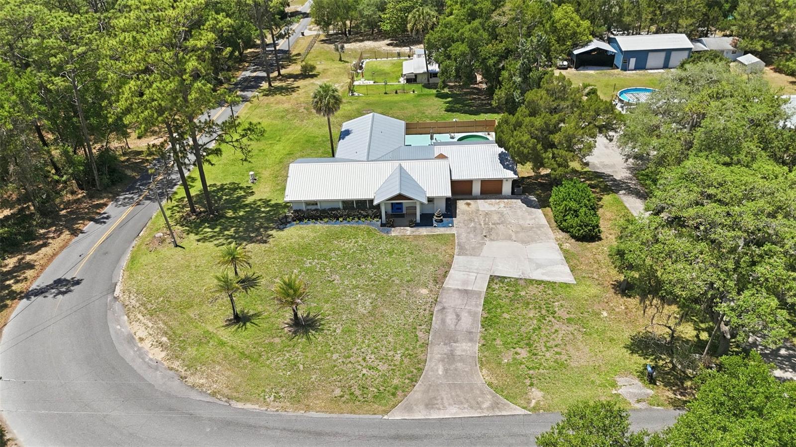 37237 GRAYS AIRPORT RD, LADY LAKE, FL — photo 100