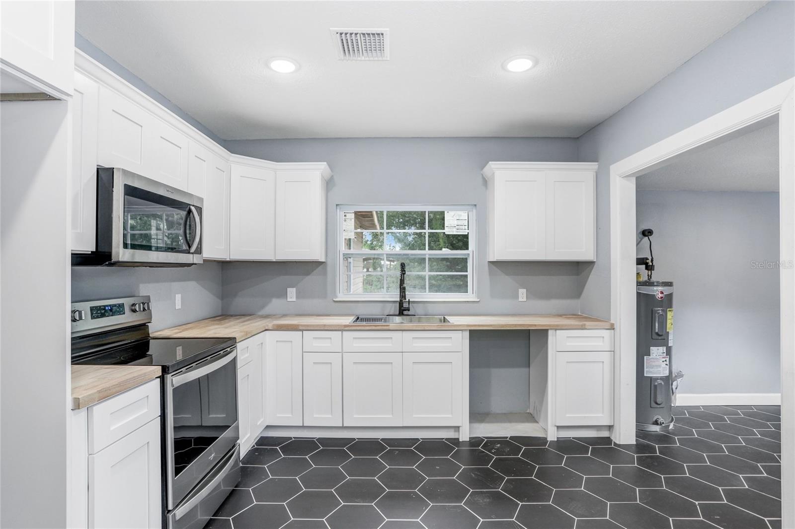 310 S DELANEY AVE, AVON PARK, FL — photo 19