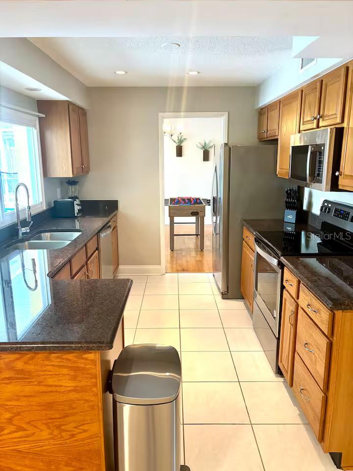 1201 KAPOK KOVE CIR, CLEARWATER, FL — photo 12