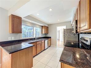 1201 KAPOK KOVE CIR, CLEARWATER, FL — photo 13