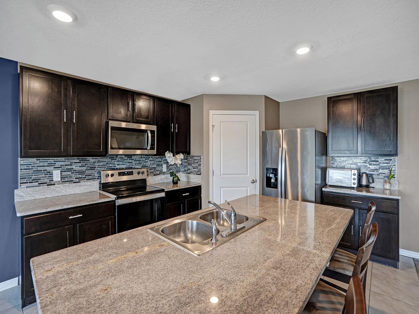 7850 SAIL CLOVER LN, ZEPHYRHILLS, FL — photo 10