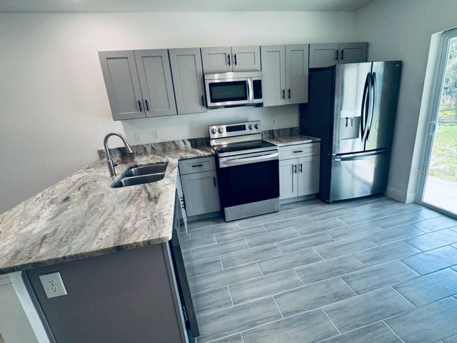 309 CLERMONT DR #B, POINCIANA, FL — photo 9