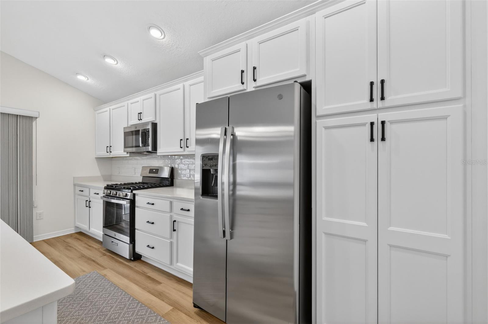 6857 BAYSINGER PATH, THE VILLAGES, FL — photo 24