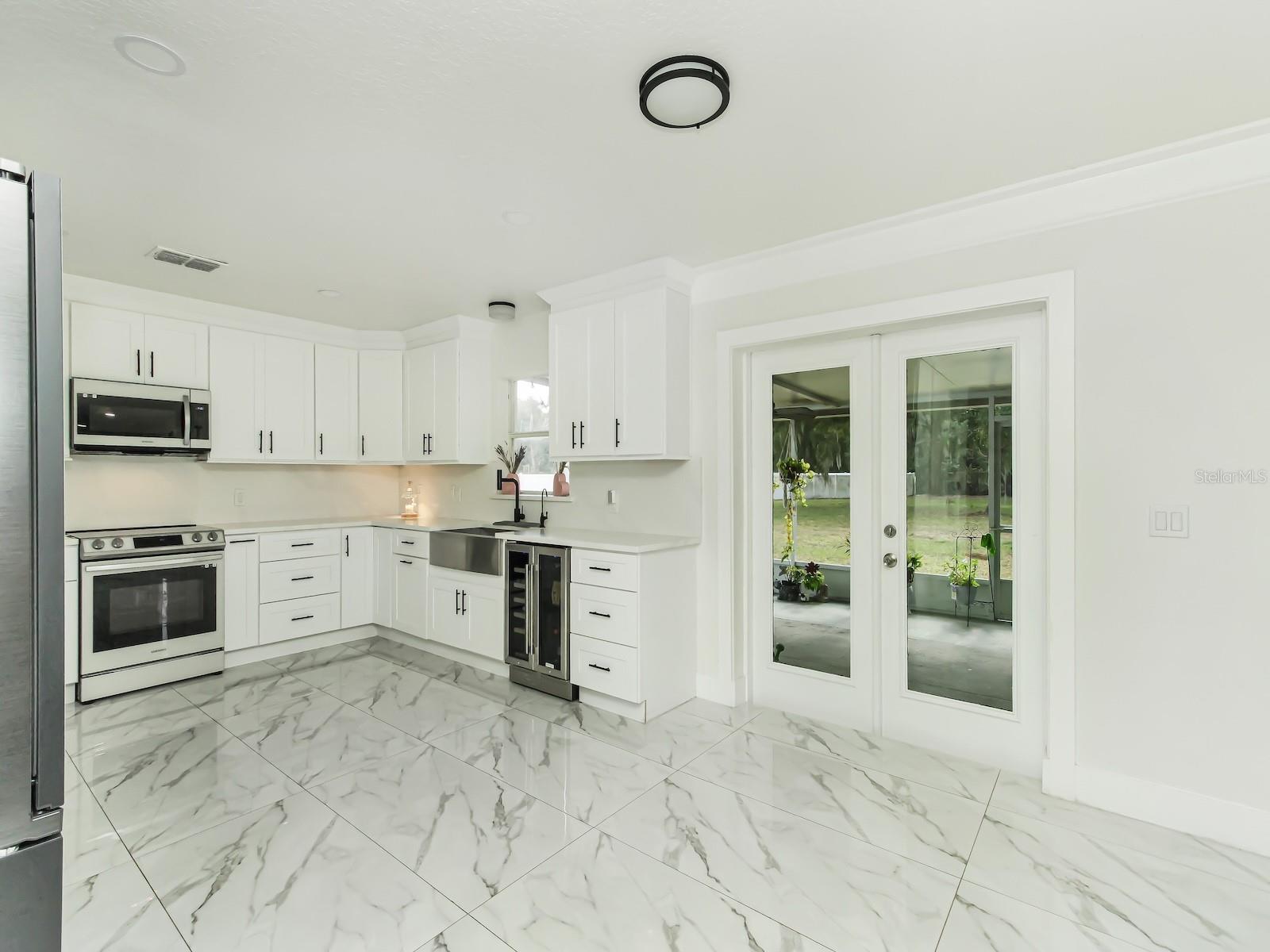 7561 LAKE ANDREA CIR, MOUNT DORA, FL — photo 15
