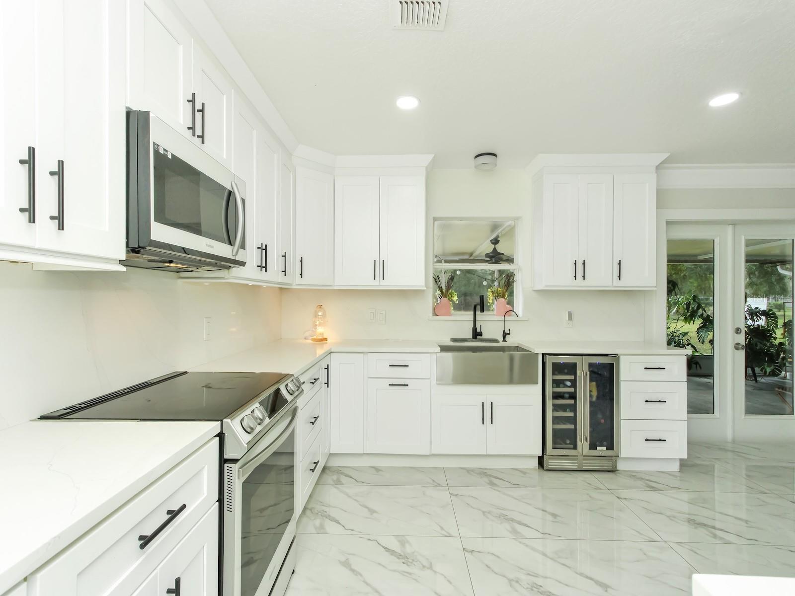 7561 LAKE ANDREA CIR, MOUNT DORA, FL — photo 19