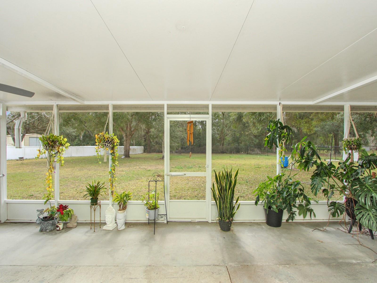 7561 LAKE ANDREA CIR, MOUNT DORA, FL — photo 33
