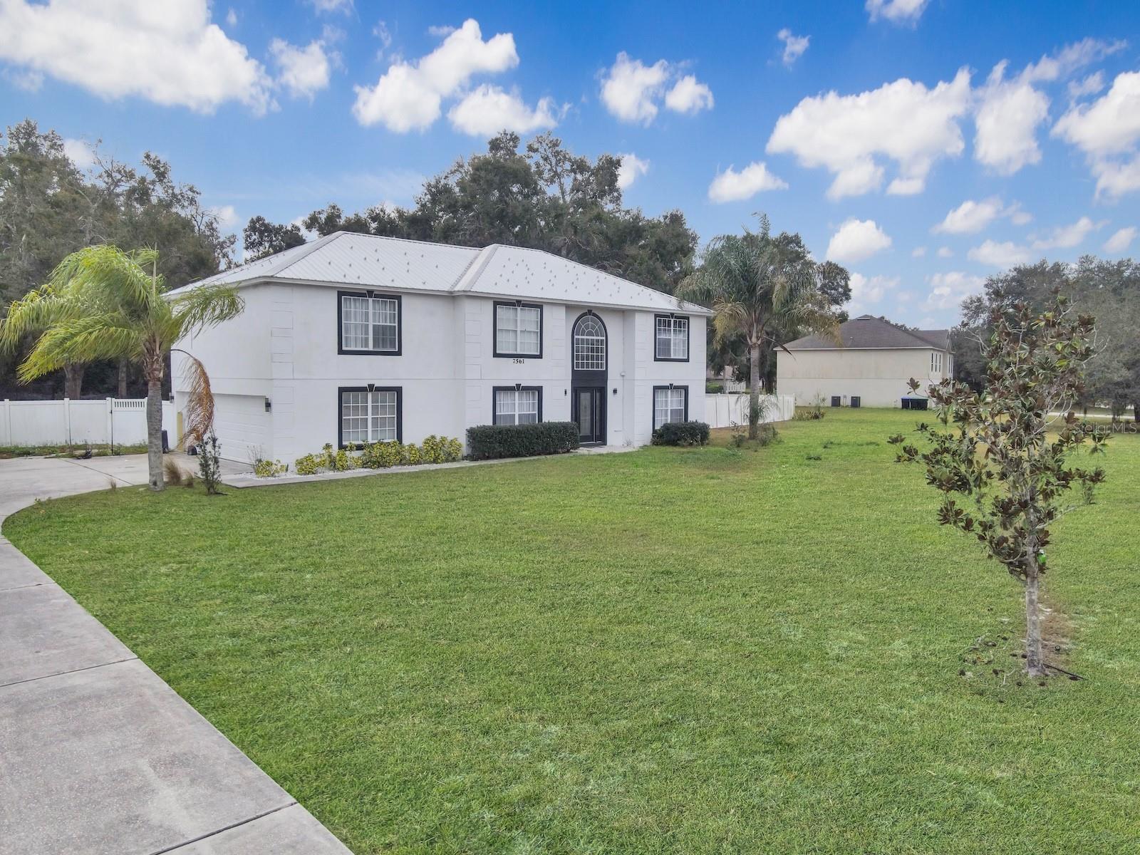 7561 LAKE ANDREA CIR, MOUNT DORA, FL — photo 34