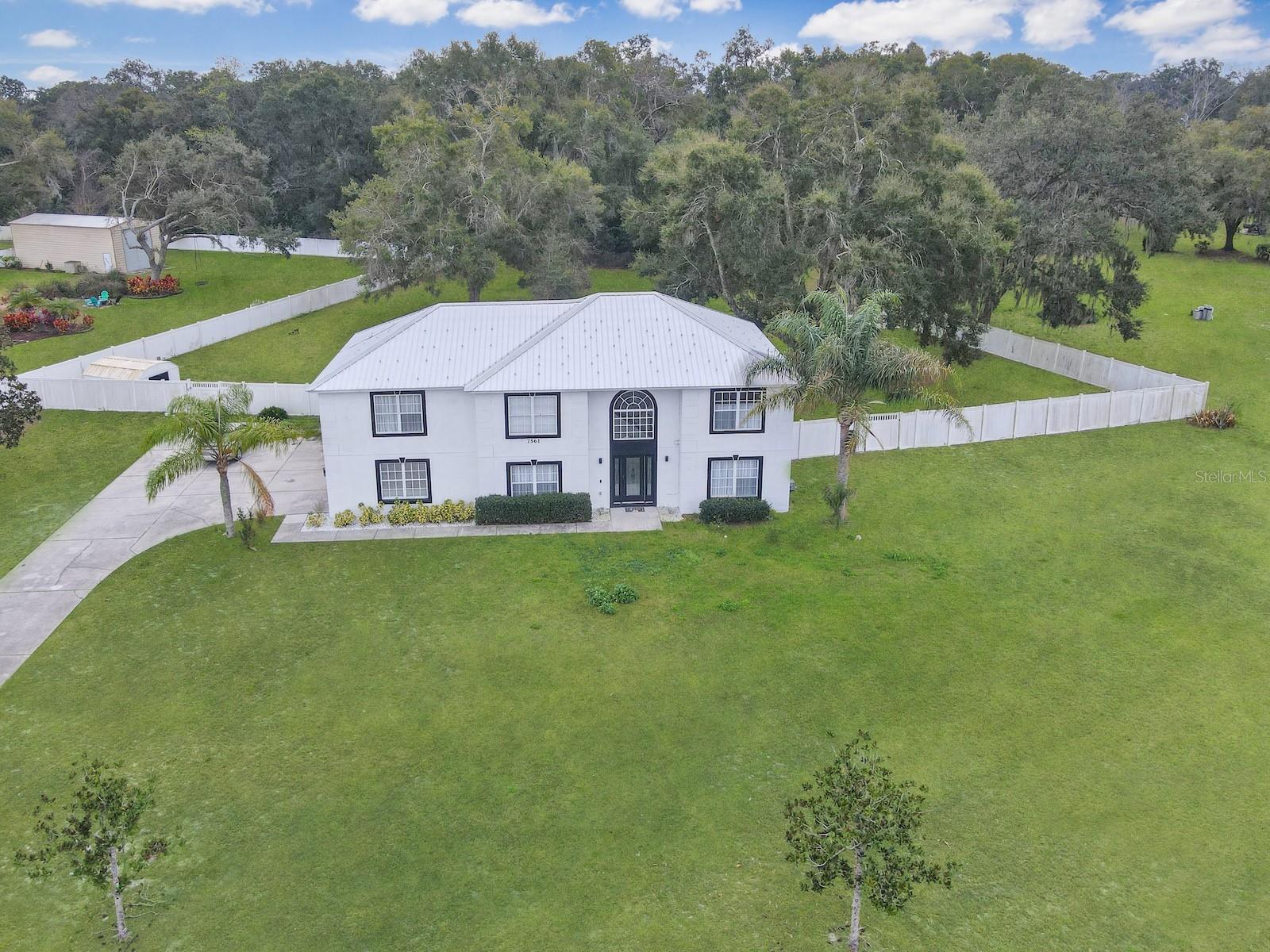 7561 LAKE ANDREA CIR, MOUNT DORA, FL — photo 38
