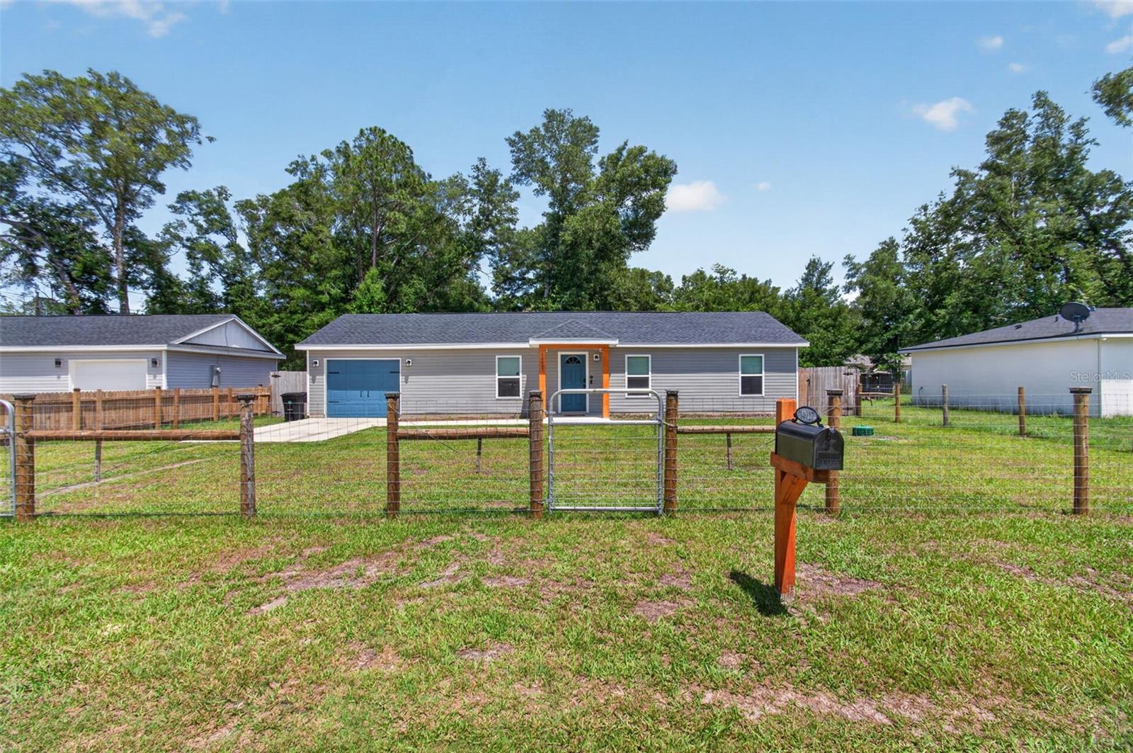 14027 SE 43RD TER, SUMMERFIELD, FL — photo 2