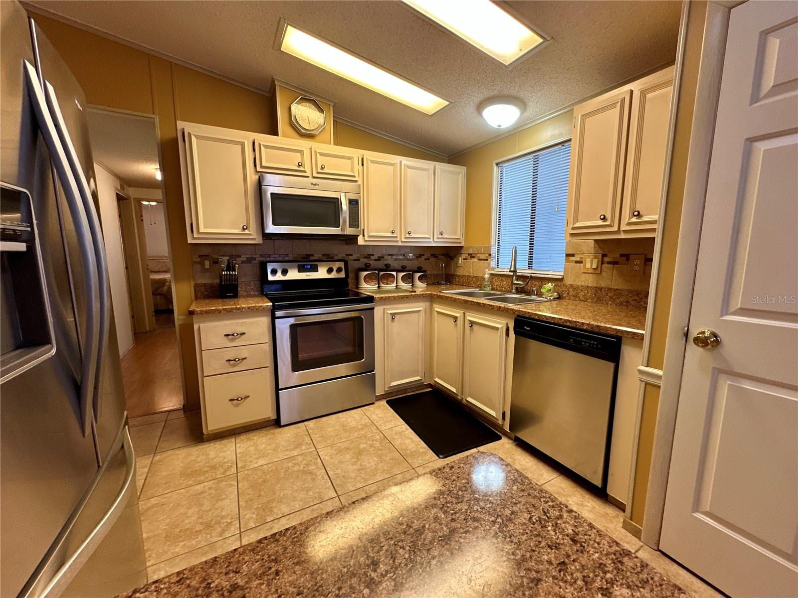 1704 LILLY LN, THE VILLAGES, FL — photo 10